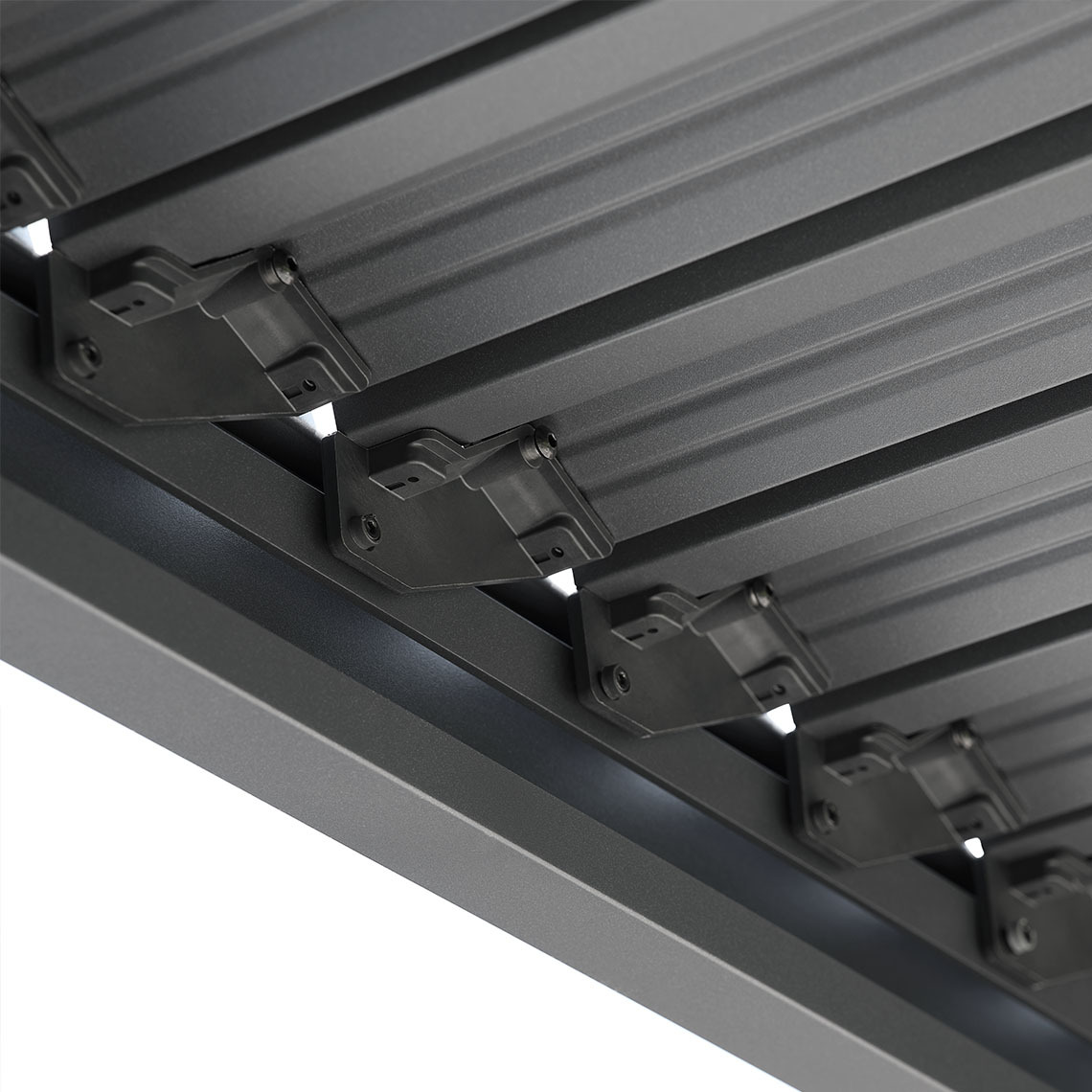 The KONGEMOSE pergola has adjustable roof slats Black modern metal pergola with closed and adjustable roof slats