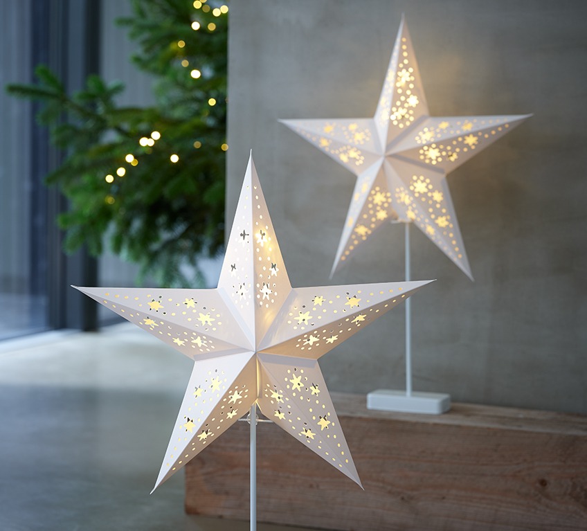 Dwie lampki akumulatorowe w kształcie białych gwiazd bożonarodzeniowych