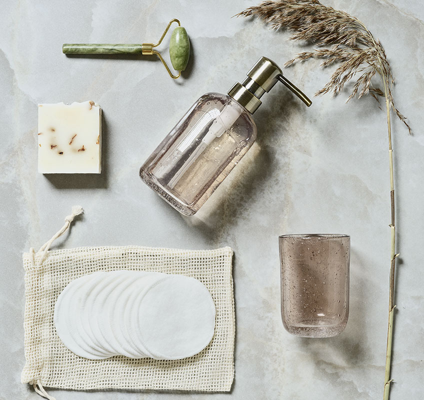 VALLSTA face roller in jade stone, ESSVIK soap dispenser and toothbrush and VAD makeup pads Face roller in jade stone and soap dispenser in recycled glass